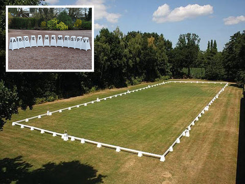 Photograph of Dressage Arena, 20 by 60 metres in field, complete with Dressage Tower Markers. Option includes 12 Dressage Tower Markers.