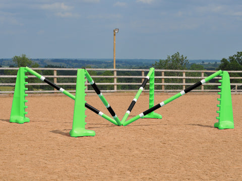 Spider set in arena comprised of: 2 pairs of Eco 8 Cups and 4 9 Band Pro Poles coloured: Lime Green, White & Black.