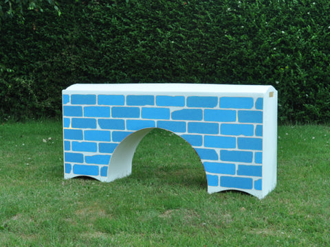 Photograph of a White Bridge Filler with a Blue Brick graphic.