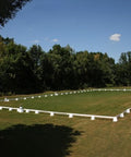 Photograph of Dressage Arena, 20 by 40 metres in field, complete with Dressage Tower Markers.