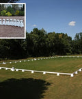 Photograph of Dressage Arena, 20 by 40 metres in field, complete with Dressage Tower Markers. Option includes 12 Dressage Tower Markers.