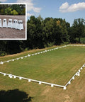 Photograph of Dressage Arena, 20 by 60 metres in field, complete with Dressage Tower Markers. Option includes 8 Dressage Tower Markers. 