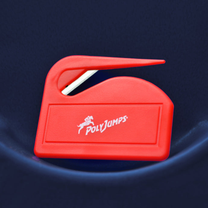 Red BaleBuster with white PolyJumps Logo on it, sitting on a Navy Blue 8 Cup jump wing. 