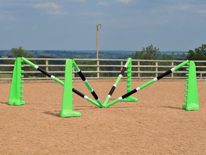 Spider set in arena comprised of: 2 pairs of Eco 8 Cups and 4 9 Band Pro Poles coloured: Lime Green, White & Black. 