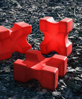 3 Red Mini Blocks sitting in arena. All on different edges to show various heights. 