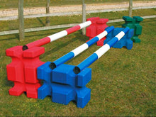 Load image into Gallery viewer, Collection of multi coloured PolyJump Blocks. Each with a matching coloured pole on top. 
