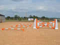 4 rows of Mini Blocks alternating orange and White with orange and white 7 Band Pro Poles. white and orange 8 Cups with matching 7 Band Pro Poles, with white Hedgehogs behind with 2 more 7 band Pro Poles.