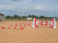 4 rows of Mini Blocks alternating Red and White with red and white 7 Band Pro Poles. white and red 8 Cups with matching 7 Band Pro Poles, with white Hedgehogs behind with 2 more 7 band Pro Poles.